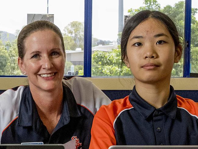 Students at Saint Stephens College are live streaming into their classes as part of Coronavirus quarantine measures. Students (l-r on laptop screen) Zarita Li  and  Ganya streaming into the classroom, with classmates Jerry Yu (l) and Sumin Kim (r) and teacher Natalie Mullan.  Picture: Jerad Williams