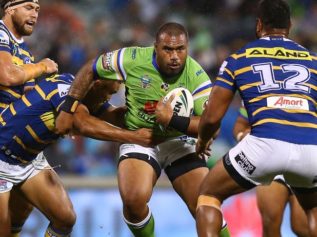 CANBERRA, AUSTRALIA - APRIL 14: Junior Paulo of the Raiders runs the ball during the round six NRL match between the Canberra Raiders and the Parramatta Eels at GIO Stadium on April 14, 2018 in Canberra, Australia.  (Photo by Mark Nolan/Getty Images)