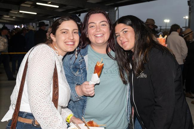 Taylah De Landelles-Jansen, Tarryn Wilde and Amber Saron at the PBR Bull Pit Bull Bash at Dittmann Bucking Bulls in Bloomsbury. August 27, 2022. Picture: Michaela Harlow