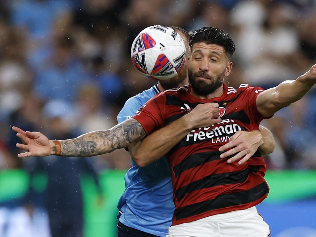 Sydney FC’s Rhyan Grant competes with Wanderers’ Brandon Borrello for the ball. Picture: Getty Images