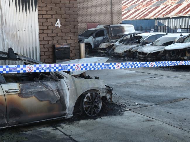 Eight vehicles were torched. Picture: David Crosling