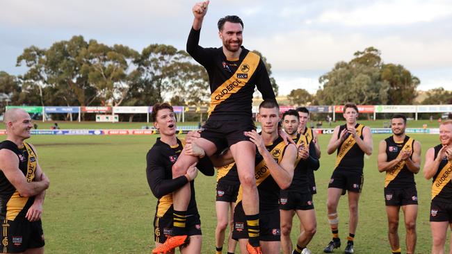 Liam McBean is chaired from the ground following his 100th game for Glenelg against Central District in round 7. Picture: Supplied