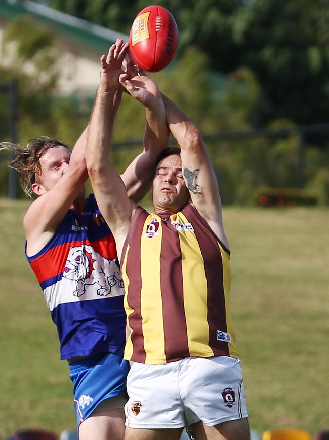 Fred Pittorino (right) flies high for a mark. Picture: BRENDAN RADKE