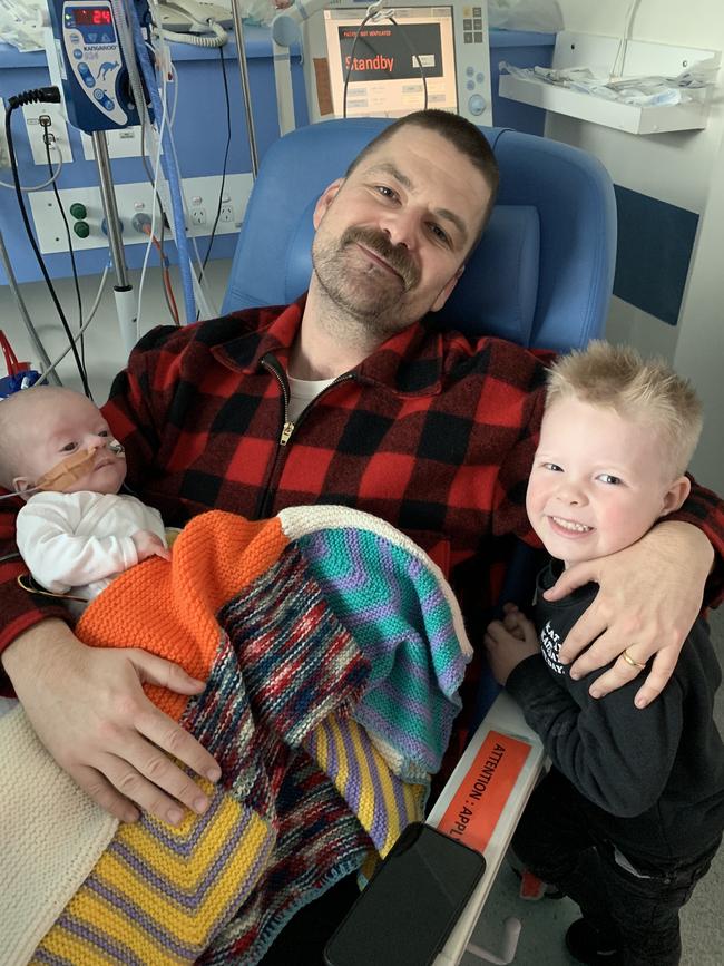 Jack with his dad Kieran and big brother Marlowe.