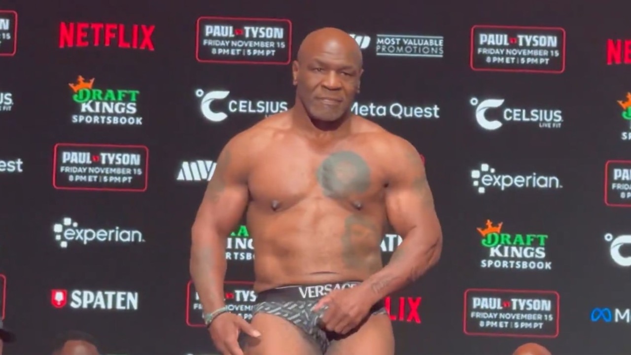 Mike Tyson grabs his crotch at the weigh in for his fight against Jake Paul. Picture: X