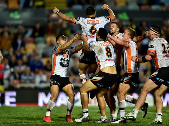 Benji Marshall kicks the field goal to win . NRL; North Queensland Cowboys Vs West Tigers at 1300Smiles Stadium. Picture: Alix Sweeney