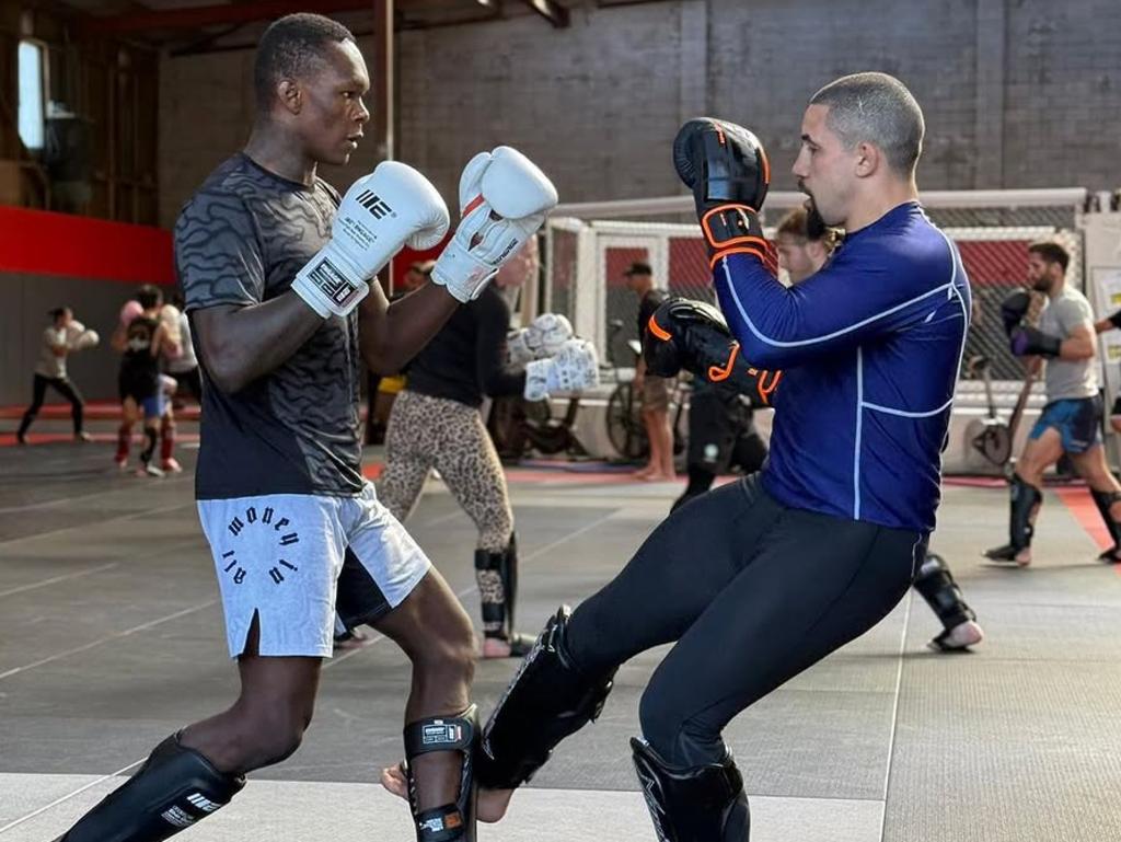 'Rivals one day, friends the next': Rob Whittaker training with Israel Adesanya. Picture: Instagram