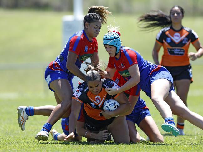 Sofaia Vaki is brought to ground. Picture: Michael Gorton