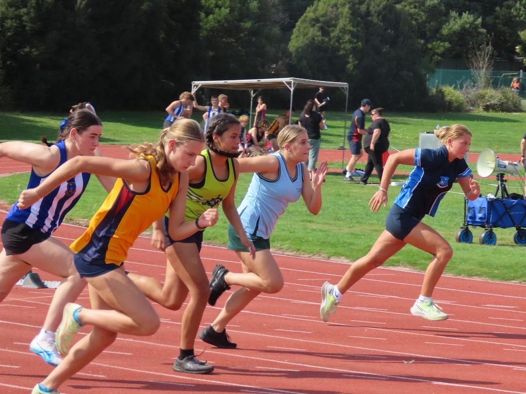 Athletes compete in the girls' under-16 100m. Picture: Jon Tuxworth