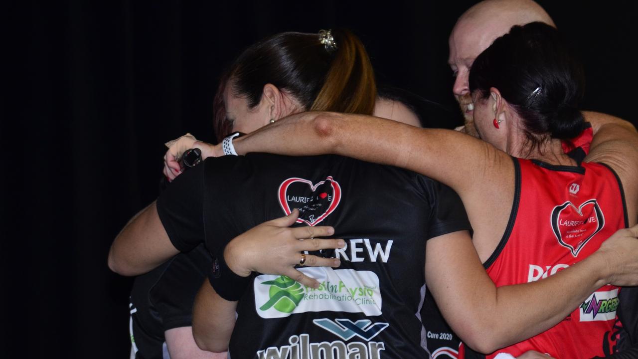 Laurie's Love Row for a Cure organisers embrace after announcing the event raised $134,000 for Laurie's Love.