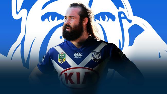 Aaron Woods signs with the Bulldogs.