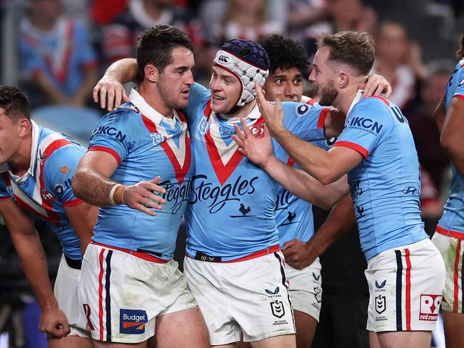 SYDNEY, AUSTRALIA - APRIL 25: Nat Butcher of the Roosters celebrates scoring a try with Luke Keary of the Roosters and SamÃÂ Walker of the Roosters during the round eight NRL match between St George Illawarra Dragons and Sydney Roosters at Allianz Stadium, on April 25, 2024, in Sydney, Australia. (Photo by Cameron Spencer/Getty Images)