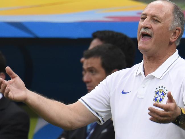 Brazil's coach Luiz Felipe Scolari reacts during the third place play-off football match between Brazil and Netherlands during the 2014 FIFA World Cup at the National Stadium in Brasilia on July 12, 2014. Netherlands won 3-0. AFP PHOTO / FABRICE COFFRINI