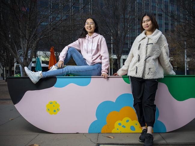 Australian National University students Qingyan Zhuan and Fenghua Chen on campus. Picture: Sean Davey