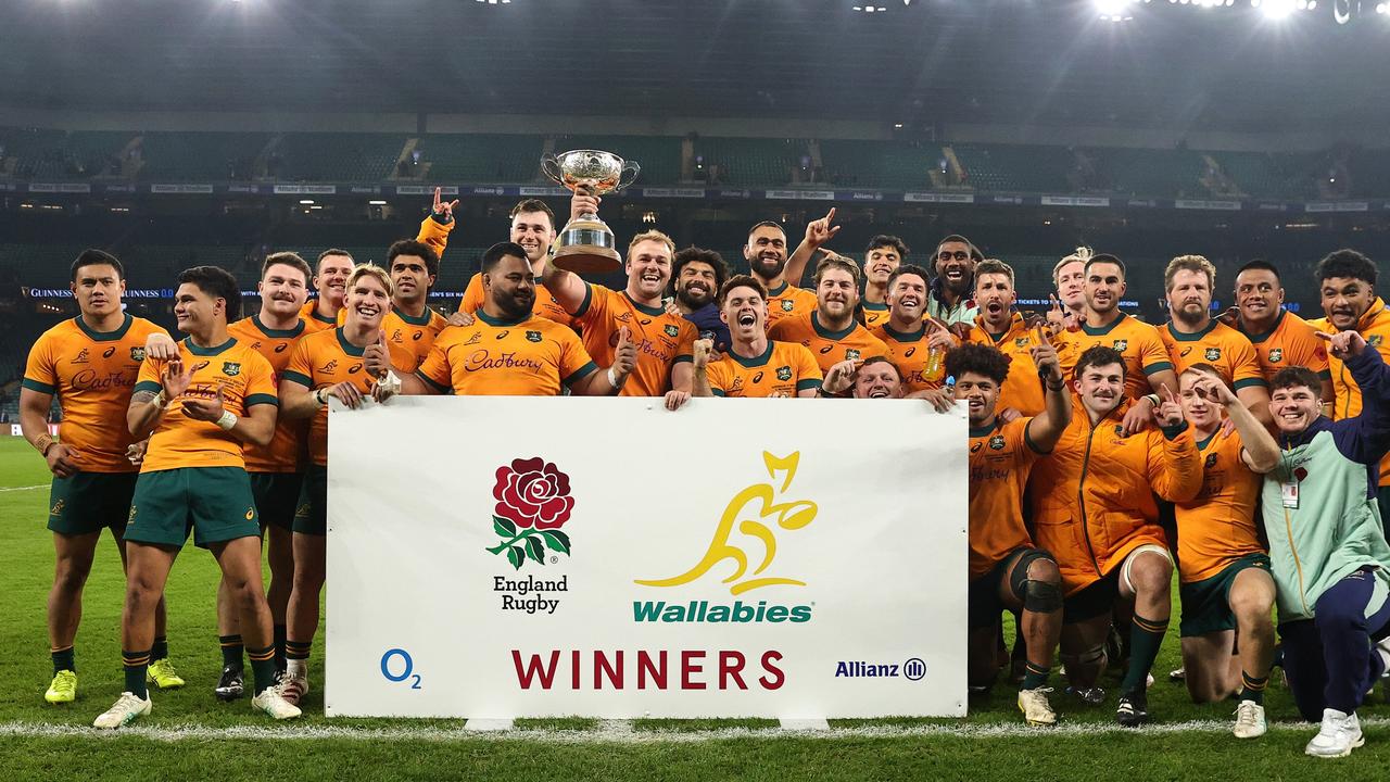 The Wallabies celebrate with the Ella Mobbs Cup after their victory during the Autumn Nations Series against England. (Photo by David Rogers/Getty Images)