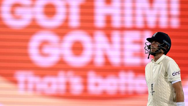 Joe Root walks off after being dismissed by Scott Boland again in Hobart. Picture: Steve Bell/Getty Images