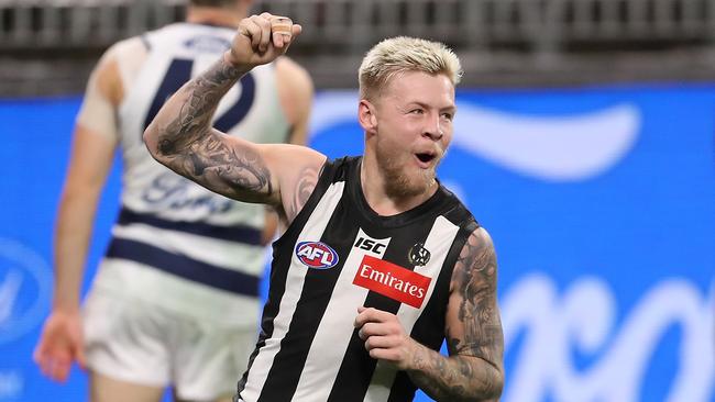 PERTH, AUSTRALIA - JULY 16: Jordan De Goey of the Magpies celebrates a goal during the round 7 AFL match between the Geelong Cats and the Collingwood Magpies at Optus Stadium on July 16, 2020 in Perth, Australia. (Photo by Paul Kane/Getty Images)