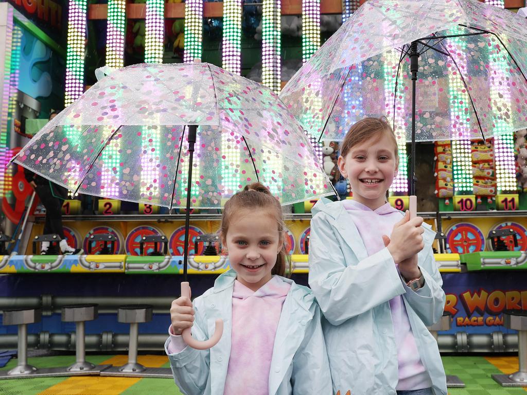 Zoe Martin, 6 and her sister Penelope Martin, 8, at the Ekka. Picture: Liam Kidston