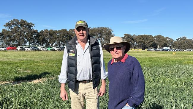 Sven Koljo of Cropmark Seeds, North East Victoria is pictured with Bill McDonnell of Lockhart, southern NSW inspecting the crop trials at the Henty Machinery Field Days. Picture: Nikki Reynolds