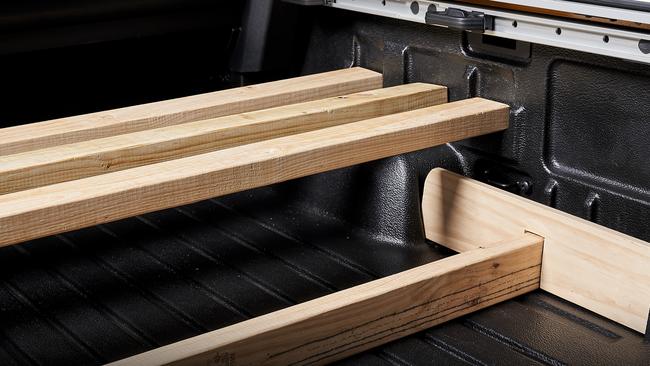 The tray can be divided up into segments using wood dividers.