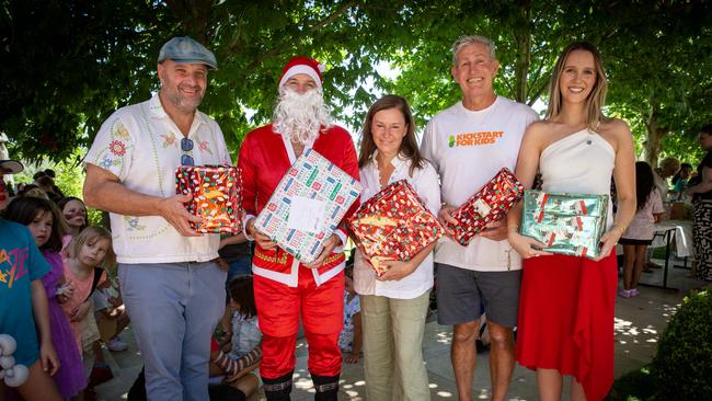 Andrew Nugent, Dan Demaria as Santa, Susie Nugent, Ian Steel and Zoe Buttery at KickStart For Kids Christmas Party hosted by Bird In Hand Winery in Woodside, SA. Picture: Emma Brasier