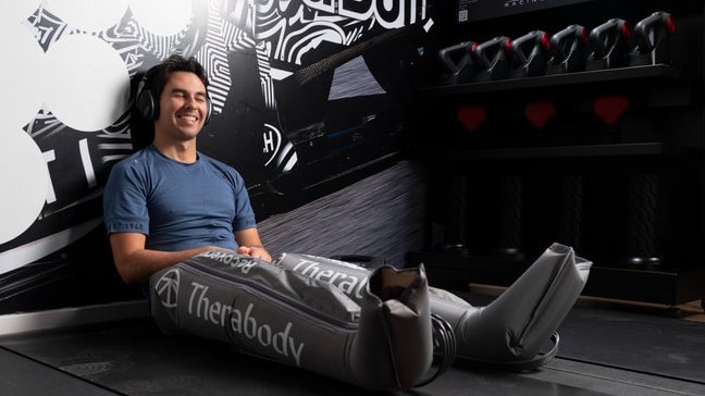 F1 driver Sergio Perez test drives the compression pants. pictuer: Twitter