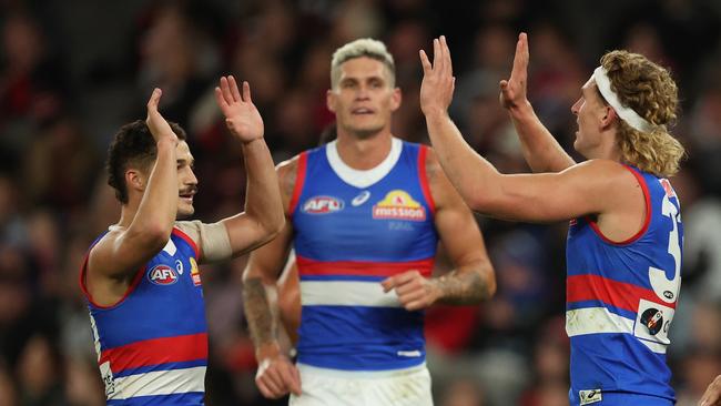 MELBOURNE, AUSTRALIA - APRIL 18: Aaron Naughton of the Bulldogs celebrates after scoring a goal during the round six AFL match between St Kilda Saints and Western Bulldogs at Marvel Stadium, on April 18, 2024, in Melbourne, Australia. (Photo by Robert Cianflone/Getty Images)