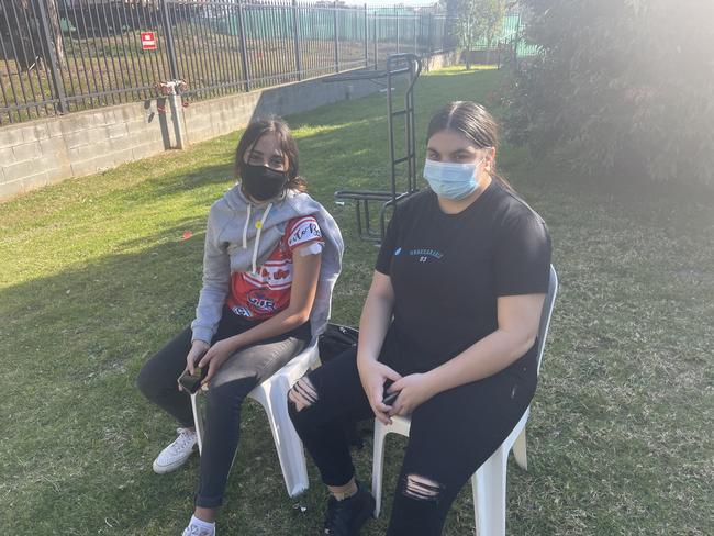 Georgia Brown and a friend after getting vaccinated. Picture: Lauren Ferri