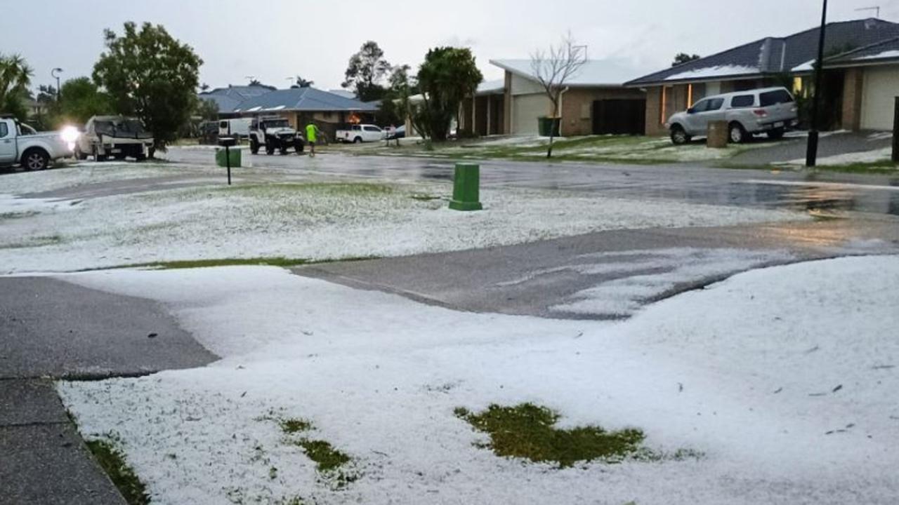 Woolies roof caves in, roads turn to ‘snow’ as massive storm front smashes Brisbane