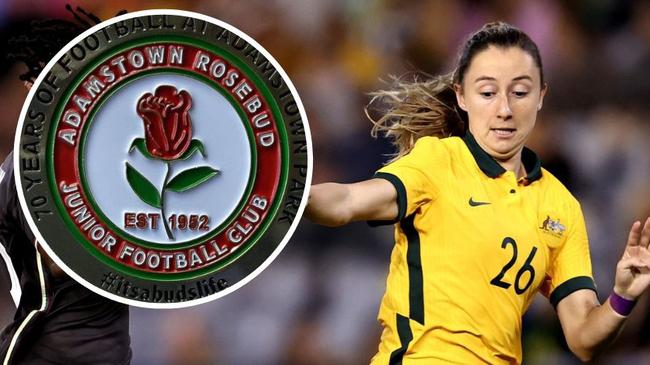 Matildas player Clare Wheeler, with the logo of her junior club Adamstown Rosebud.