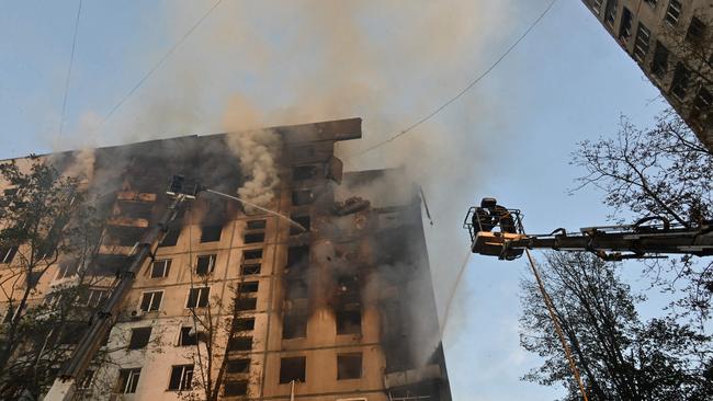 The fire in a residential building after the strike. Picture: Sergey Bobok/AFP