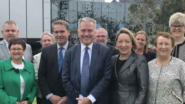 A smiling Health and Wellbeing Minister Stephen Wade at the Royal Adelaide Hospital flanked by nine of the 10 Local Health Network chief executives responding to the ICAC report into SA Health. Picture Brad Crouch