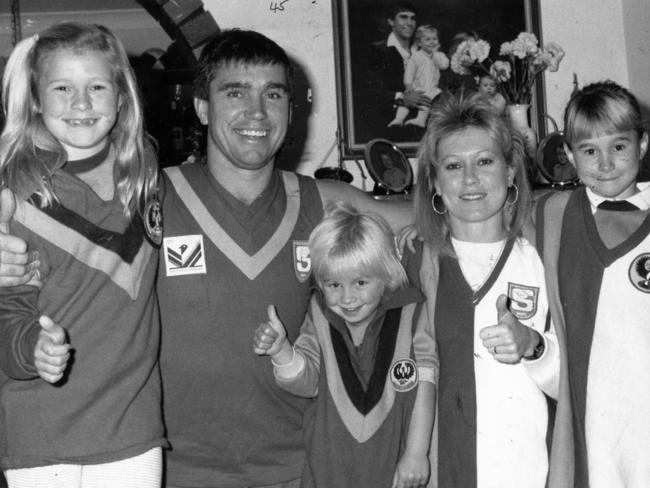 Greg Phillips in 1989 with daughters Rachel, Erin (centre), Amy and wife Julie. Picture: Ray Titus