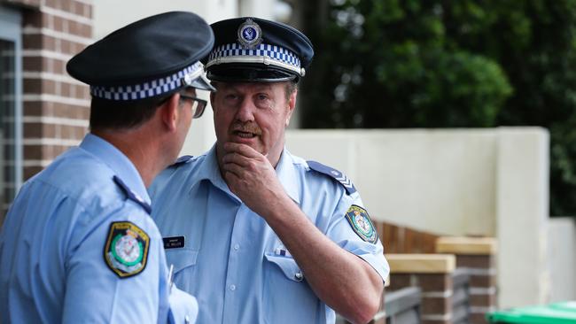 Police wait for animal rescue volunteers to take care of the deer. Picture: NCA Newswire / Gaye Gerard