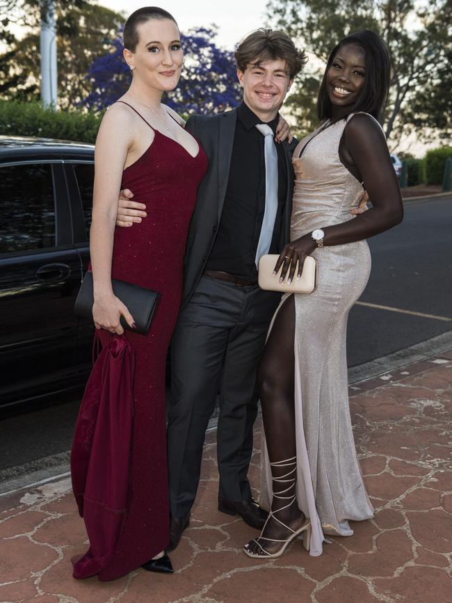 Harry Panitz with Sherece Ewing (left) and Monica Mach at Centenary Heights State High School formal at Picnic Point, Friday, November 20, 2020. Picture: Kevin Farmer