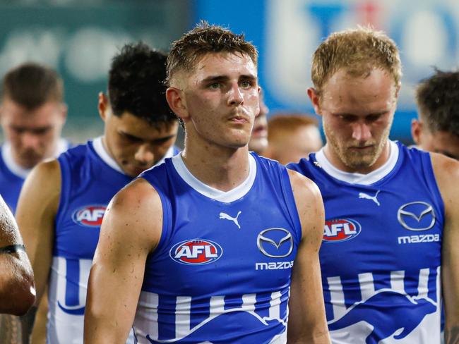 DARWIN, AUSTRALIA – MAY 11: The Kangaroos look dejected as they leave the field after the 2024 AFL Round 09 match between the Gold Coast SUNS and North Melbourne Kangaroos at TIO Stadium on May 11, 2024 in Darwin, Australia. (Photo by Dylan Burns/AFL Photos via Getty Images)