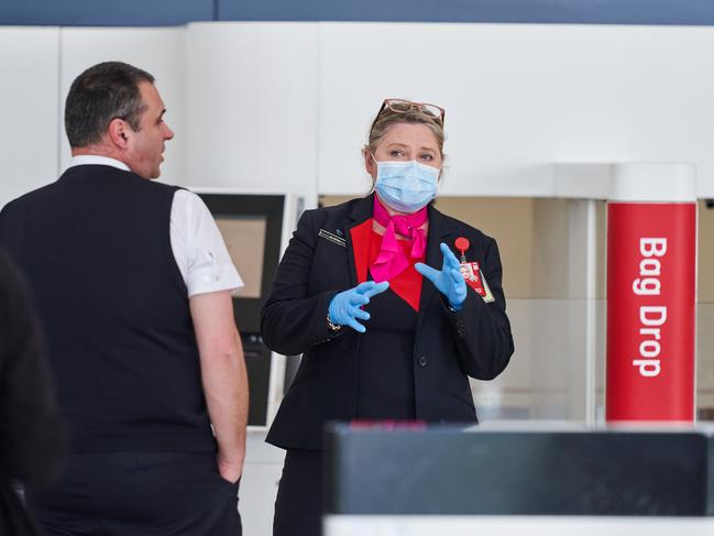 Qantas staff at Adelaide Airport, after several of the airline’s baggage handlers tested positive for COVID-19. Picture: Matt Loxton