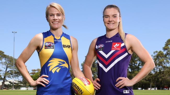 PERTH, AUSTRALIA - JANUARY 04: Dana Hooker of the West Coast Eagles and Hayley Miller of the Fremantle Dockers pose during the 2022 AFLW Season Launch Captains Media Opportunity at Melville Reserve on January 04, 2022 in Perth, Australia. (Photo by Paul Kane/Getty Images)