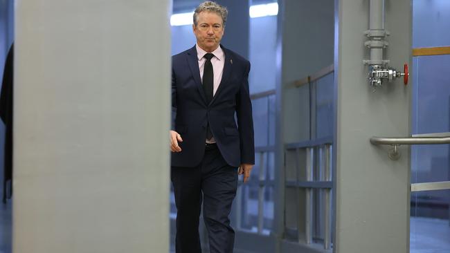 Republican senator Rand Paul walks through the subway tunnel on his way to the Caitol for the impeachment trial. Picture: AFP.