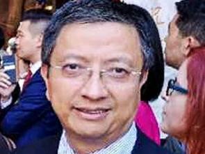 John Zhang (R) has been implicated in the raids targeting Labor MP Shaoquett Moselmane (L).