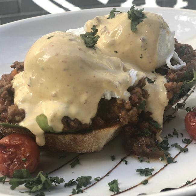 Cambridge Manly rotates eggs benny specials like their Savoury Mince Eggs Benedict.