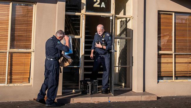 Police take away evidence from the scene of a shooting in January, 2022.