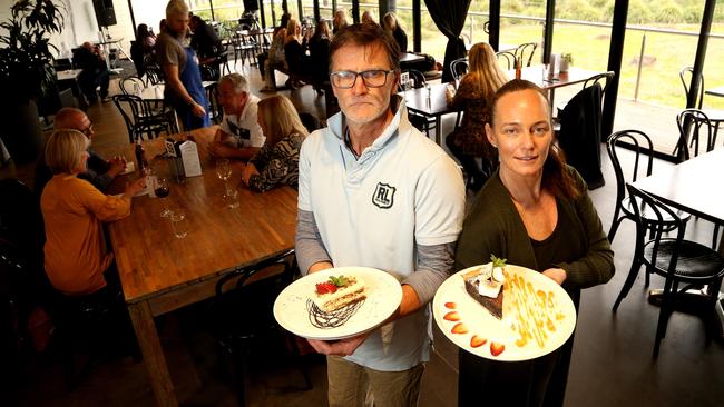 Franz Madlener, with wife and owner Brook Pollock at Arcobar, asks Dan Andrews to ‘give us a break’. Picture: Hamish Blair