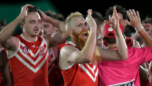 YOU BEAUTY: Yeppoon Swans players celebrate after winning their sixth straight AFL Capricornia premiership and claiming the record for the most consecutive wins in AFL history. Photo: Jann Houley