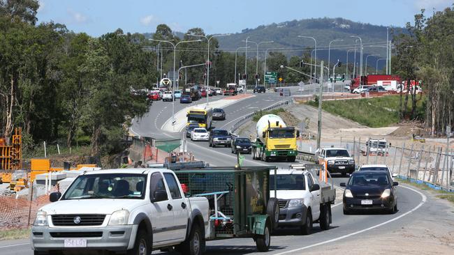 The blame game between governments and council on fixing the M1 and its blocked arteries. Roadworks continue on Foxwell Rd . Picture Glenn Hampson