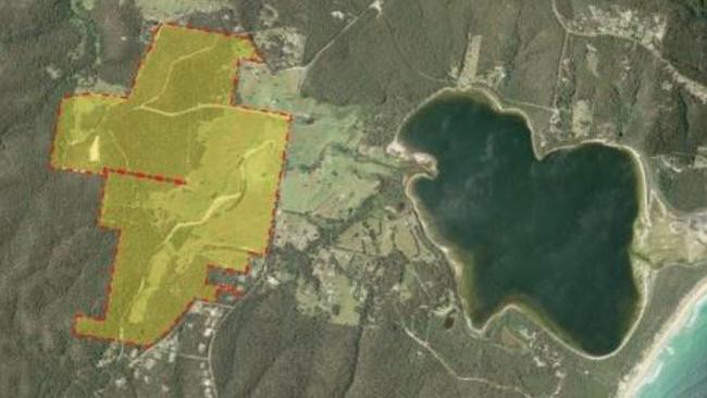 The land holding the proposed mine can be seen across the road from Wallagoot Lake. Picture: NSW Government