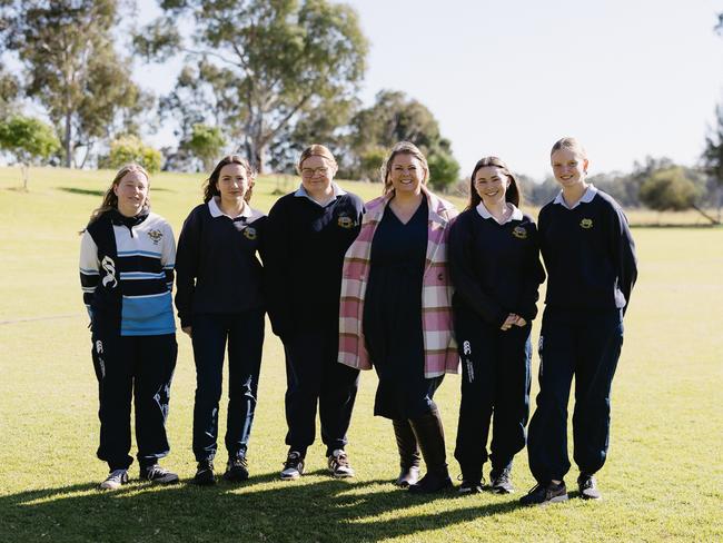 Gilgandra High School in the state’s central west has developed a groundbreaking initiative to provide free sports bras to their female students to encourage them to participate in sports after staff were alerted of pain and discomfort. Pictured (left) Molly Fairy, alana Elson, Bella Townsend, Teacher  Illana Austen, Kailee Edwards, Chloe Eason.