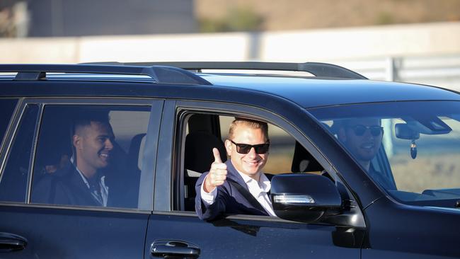 Transport Minister Stephan Knoll gives the thumbs up as he becomes the first official passenger to take a drive on the new Northern Expressway. Photo: Russell Millard / AAP.