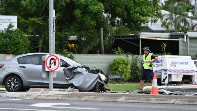 Police, firefighters and paramedics attended a serious crash between a car, motorbike and a pedestrian on the corner of Sheridan and James Street on Thursday afternoon. Picture: Emily Barker