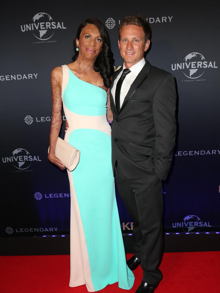 Mining engineer, burns survivor, motivationalist and author Turia Pitt and Michael Hoskin at the Australian premier of the Angelina directed feature film Unbroken at The State Theater in Sydney. Picture: Richard Dobson